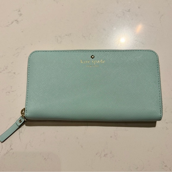 kate spade Handbags - Kate Spade Eggshell Blue Zip Wallet